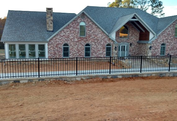 Aluminum fence on new construction house